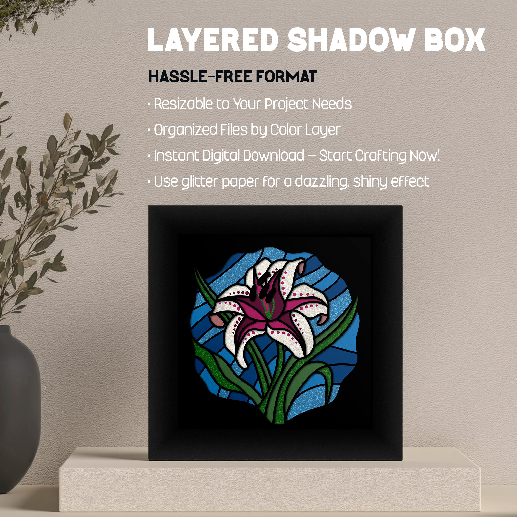 Layered shadow box displayed next to painted canvas