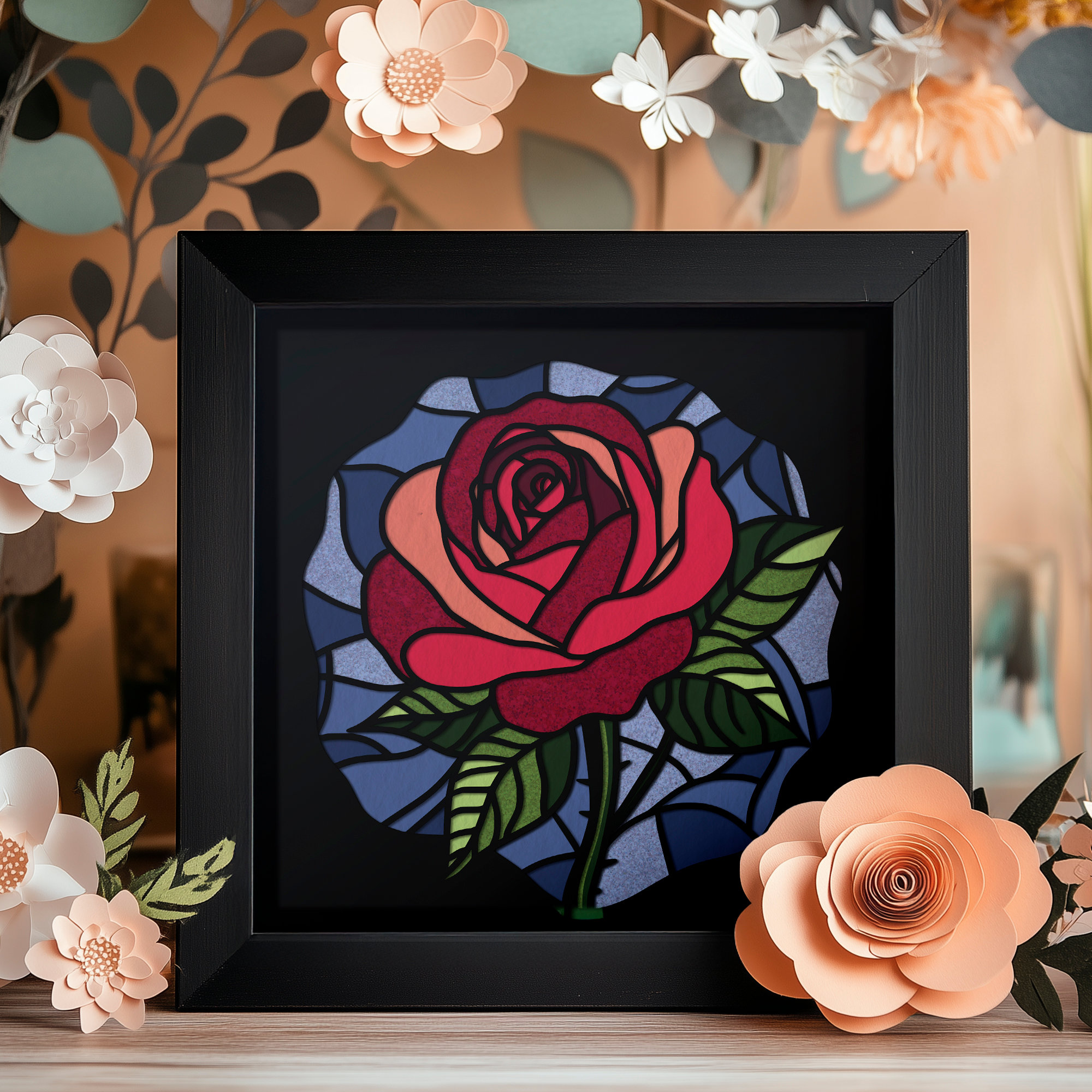 Rose Flower Shadowbox — stained-glass-style layered paper cut showing a rose with dramatic petal depth and organic layering in a deep shadow box frame