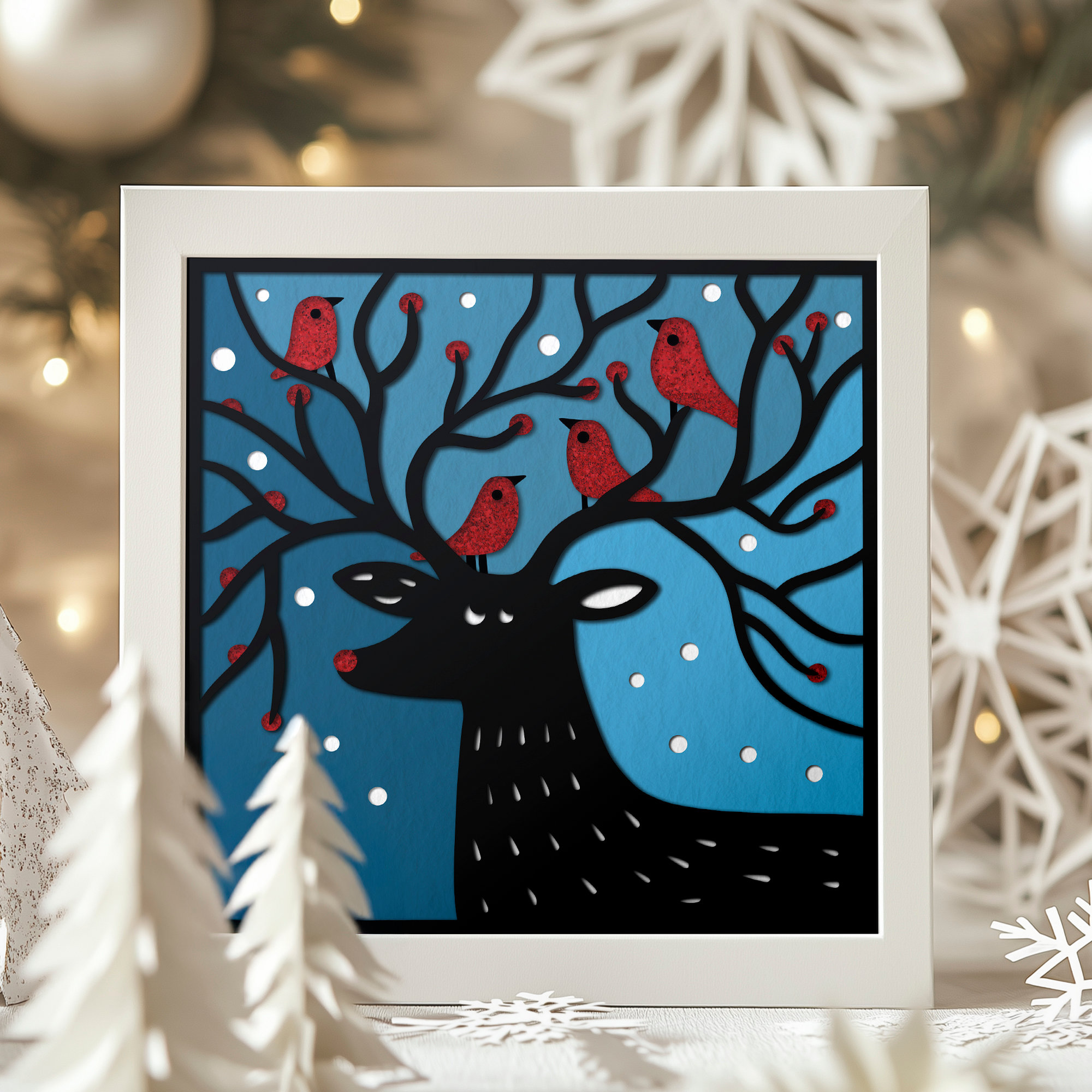 Finished layered papercut gift cards displayed together as a set of handmade greeting cards